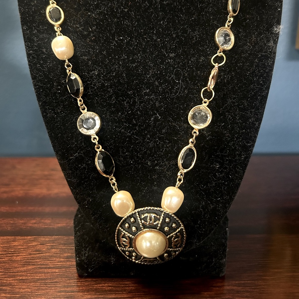 Authentic stamped Chanel Pendant on vintage baroque necklace. Classic look!